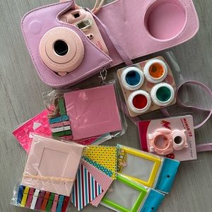 pink instax polaroid camera